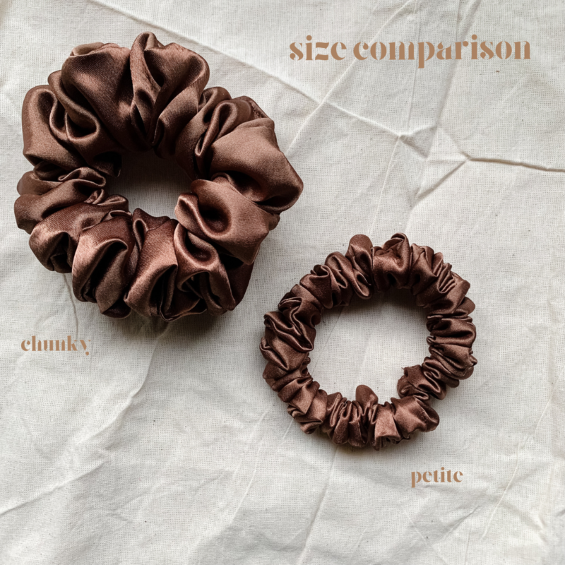 Cocoa Dream cocoa brown chunky scrunchie made from luxe charmeuse satin. Oversized design, approximately twice the size of a standard scrunchie, with a smooth, glossy finish that adds a touch of elegance and volume to any hairstyle.