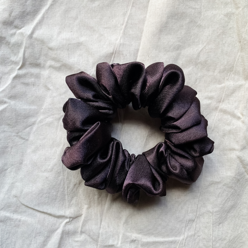 Fresh Brew coffee brown chunky scrunchie made from luxe charmeuse satin. Oversized design, approximately twice the size of a standard scrunchie, with a smooth, glossy finish that adds a touch of elegance and volume to any hairstyle.