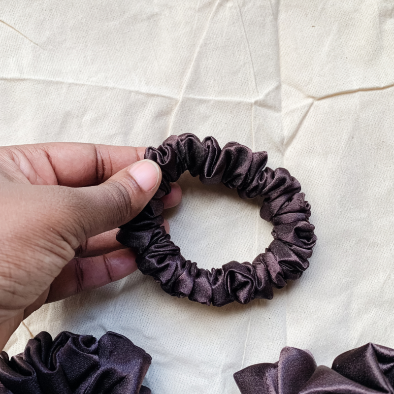 Fresh Brew coffee brown petite scrunchie made from luxe charmeuse satin. Oversized design, approximately twice the size of a standard scrunchie, with a smooth, glossy finish that adds a touch of elegance to any hairstyle.