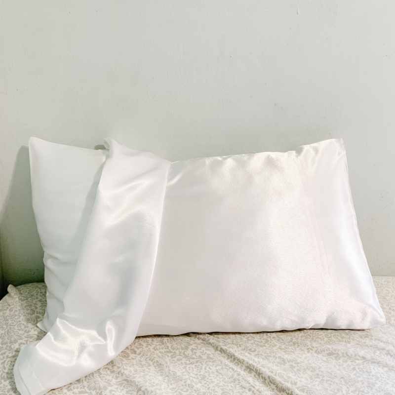 Cloud Charmeuse Silk Pillowcase – White in color, made from 100% luxurious charmeuse silk, offering a smooth and soft texture for a restful night's sleep.