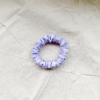 Lavender petite scrunchie made from luxe charmeuse satin. Oversized design, approximately twice the size of a standard scrunchie, with a smooth, glossy finish that adds a touch of elegance to any hairstyle.