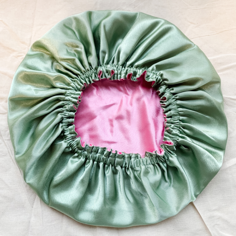 strawberry matcha bonnet, sage green and pale pink in colour.