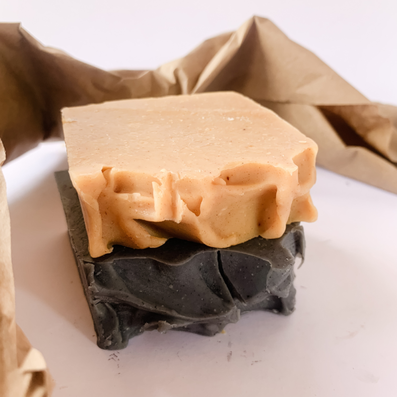 A soap stack featuring our besting Glow On (Turmeric & Carrot) and Detox (Charcoal & Peppermint) Soap Bars